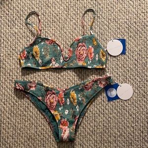 Tori Praver with tags size L bikini